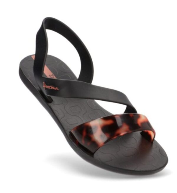 Sandalia negra con tonos cebra.